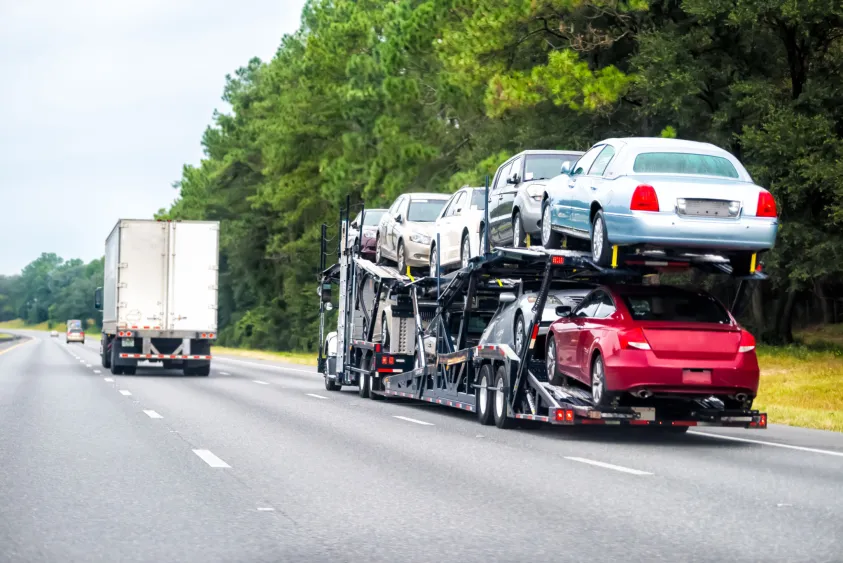 Loaded car hauler on the highway